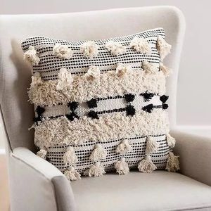 SOLD!!  Kirkland’s decorative poms & tassels throw pillow